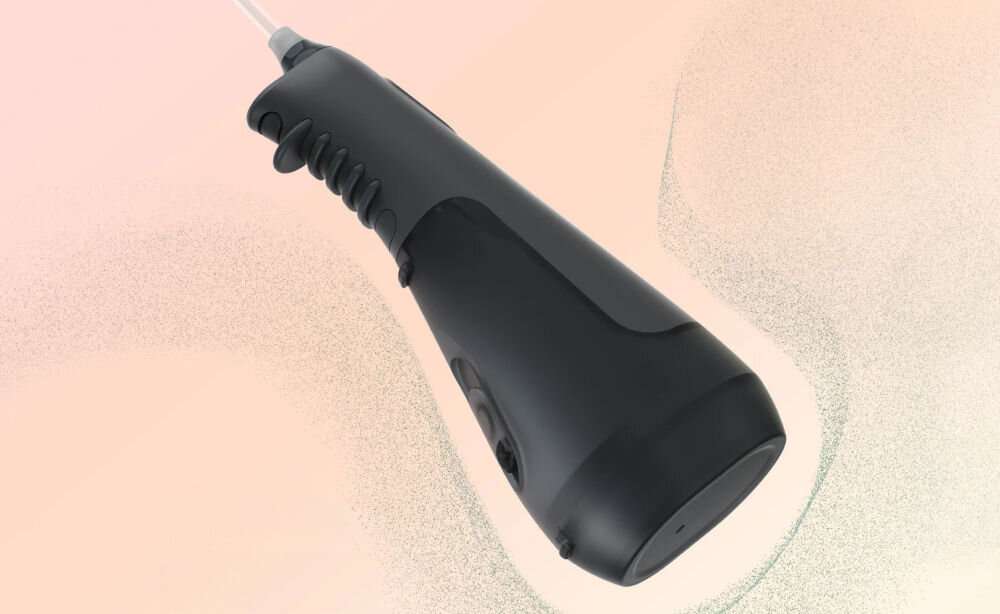 Irygator ORDO Hydro Sonic łatwiejsze skuteczniejsze czyszczenie wokół aparatów ortodontycznych mostów implantów zdrowe dziąsła bielsze zęby świeży oddech długotrwała bateria mobilność idealny towarzysz w podróży praktyczna technologia wygoda skuteczność kompleksowa pielęgnacja jamy ustnej  
